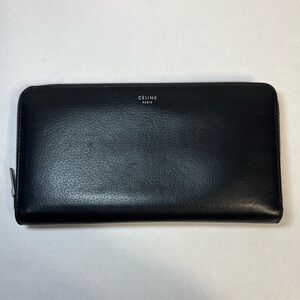 Celine Black Leather Zip‎ Around wallet with a bright yellow leather interior